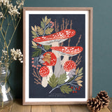 Artwork of a Fly Agaric mushroom with wooden frame.