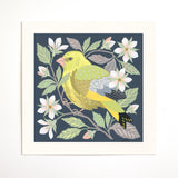 A square art print featuring a greenfinch perched among white flowers and green leaves on a dark navy background.